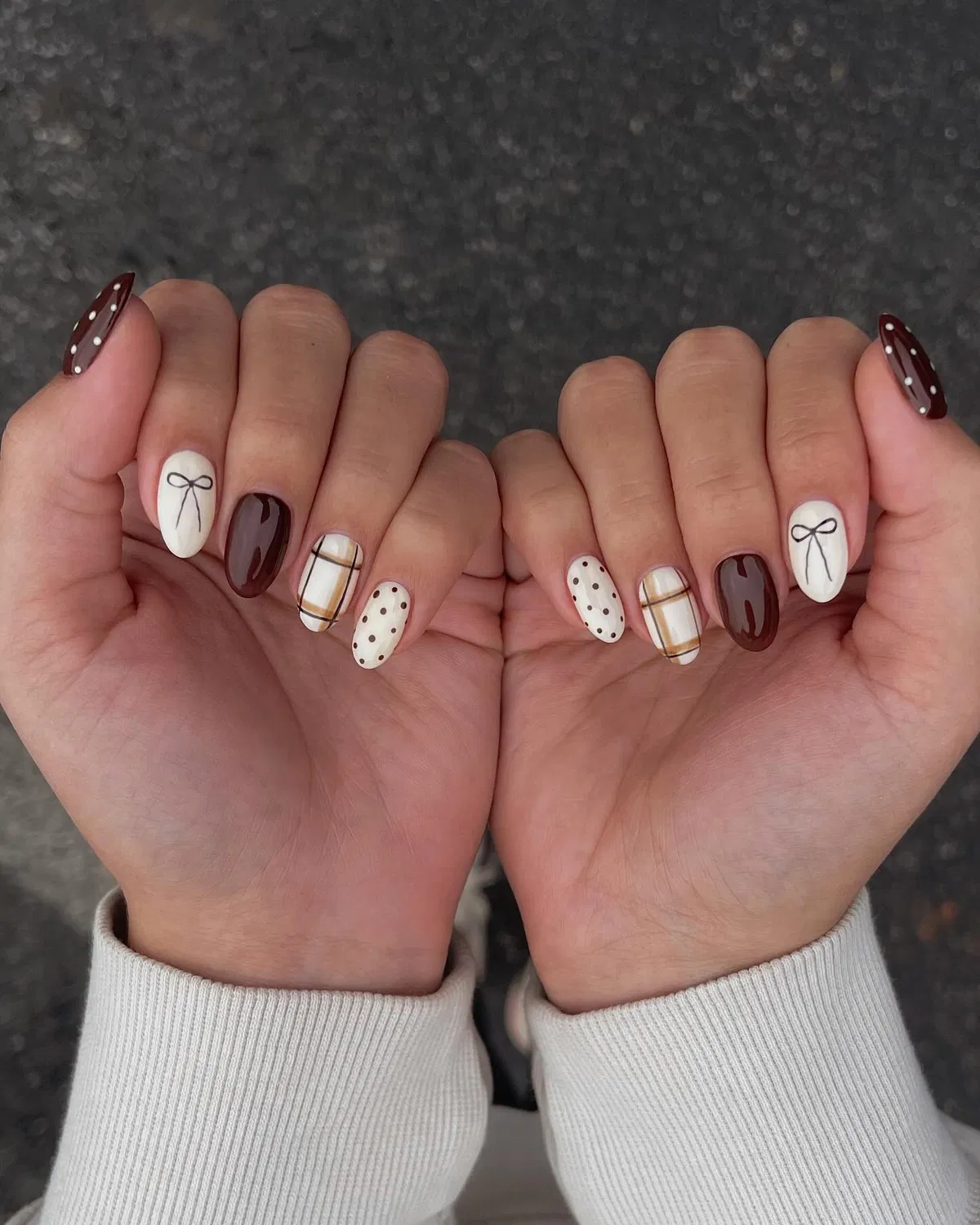Glossy almond set with bows, polka dots, plaid, and dark brown solids