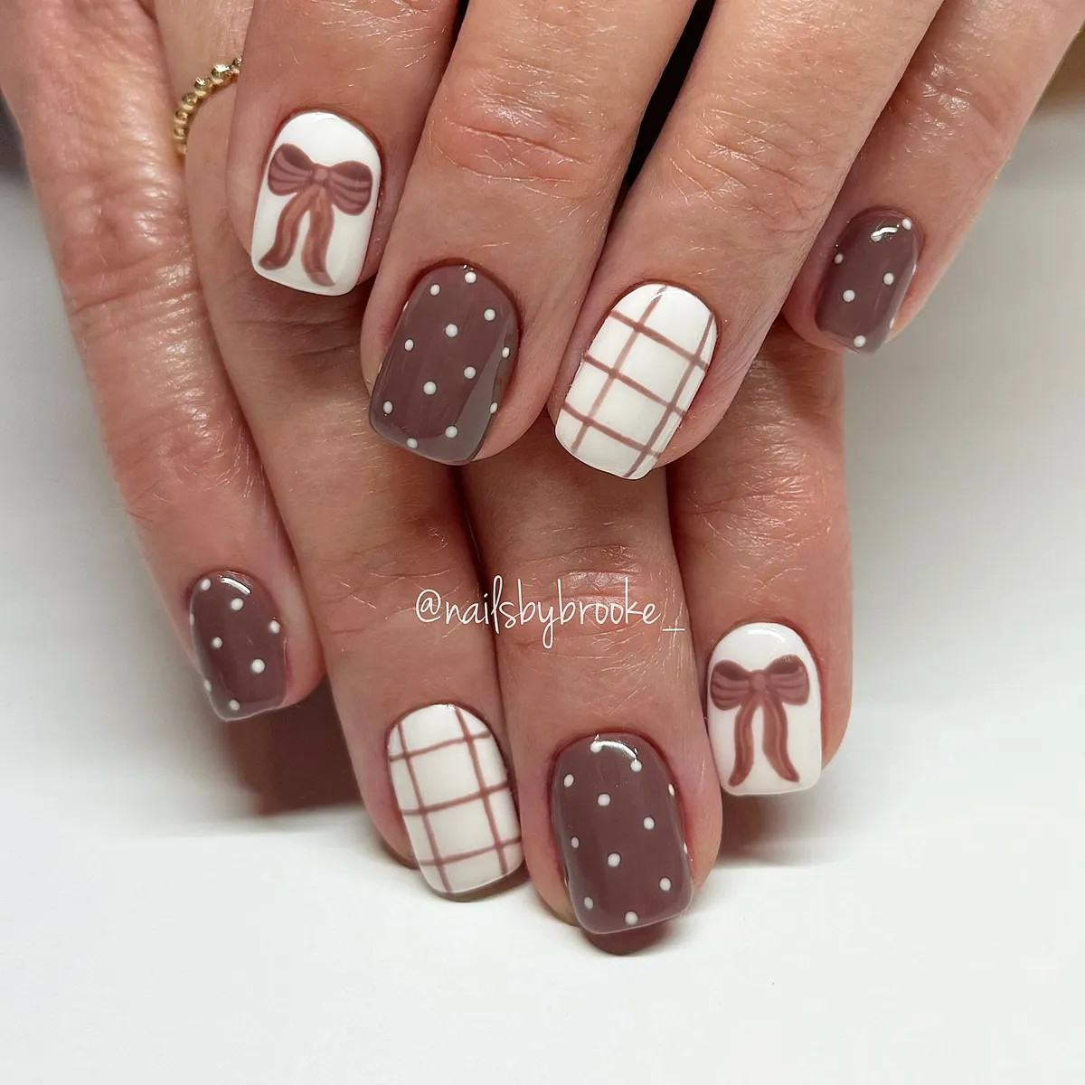 Brown polka dots with white plaid and bow accents