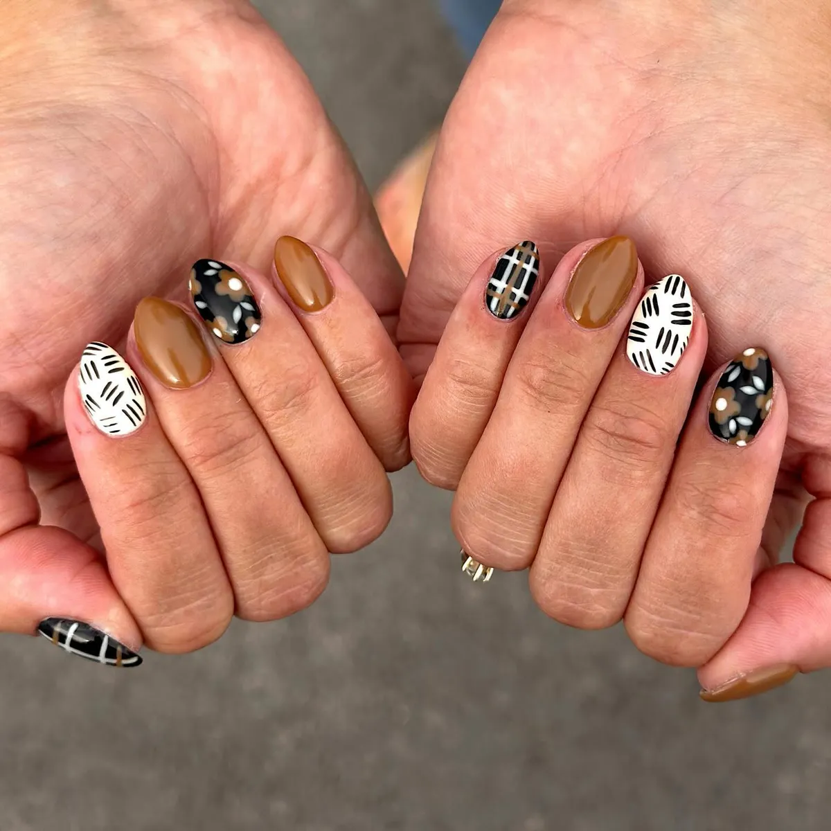 Mustard-brown solids with black speckle accents and plaid