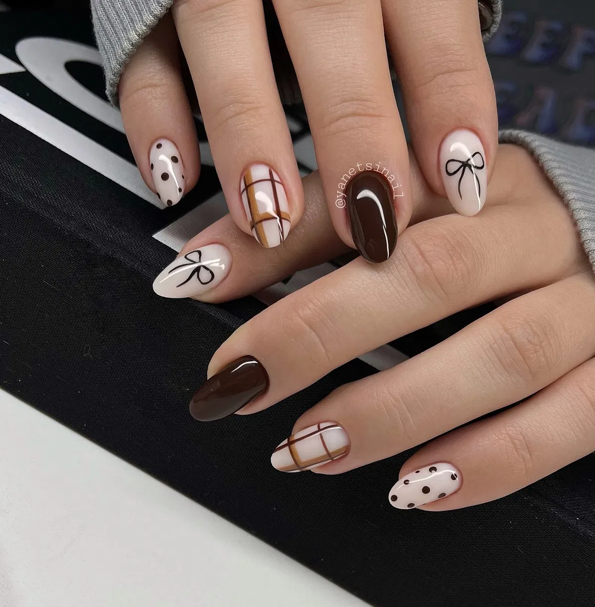 Deep brown solids with white plaid, polka dots, and bow outlines