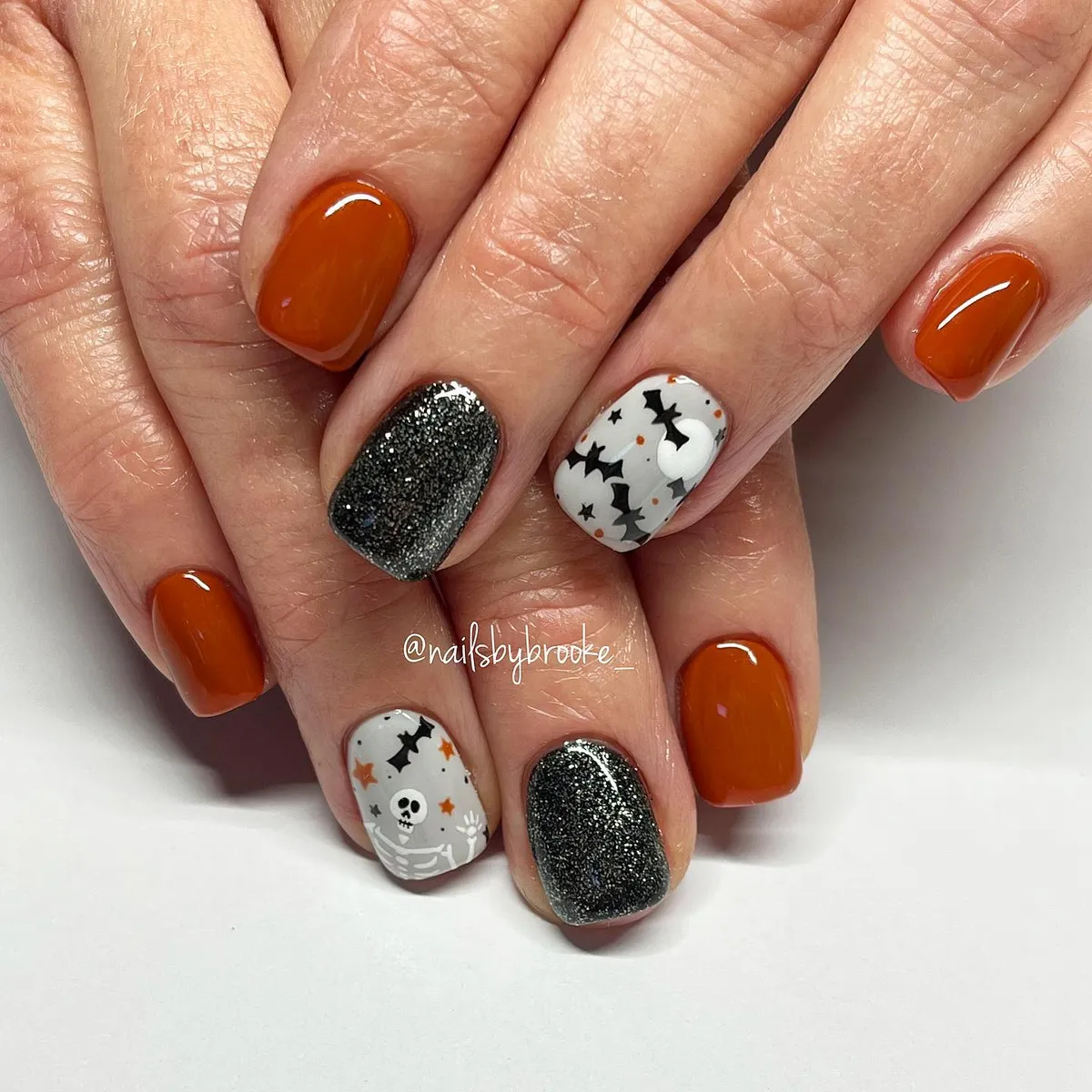 Burnt Orange with Black Glitter and White Bat Accents