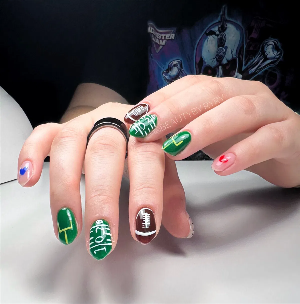 Green field markings and brown football accents