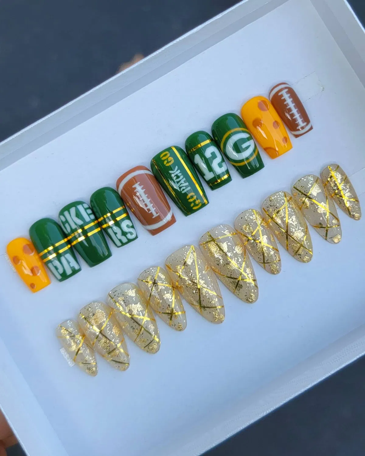 Green/yellow football set with gold-glitter accent tips