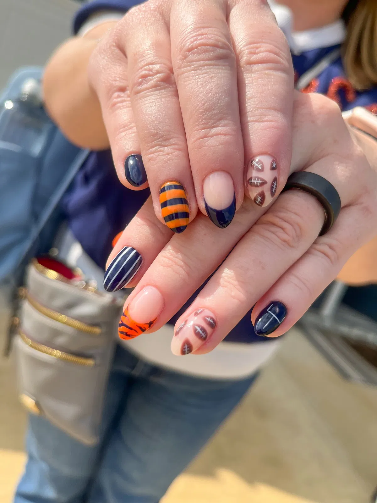 Navy and orange mix with football icons and stripes