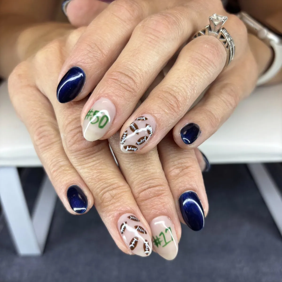 Navy solids with nude football pattern and green hashtags