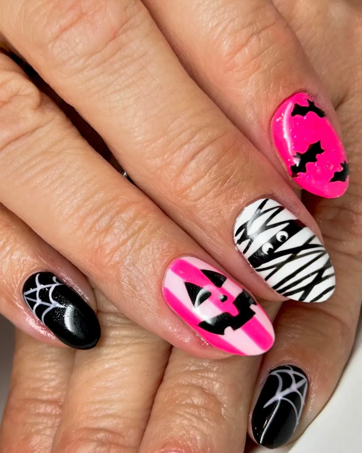 Hot pink Halloween mix with bats, mummy wrap, and spiderweb corners
