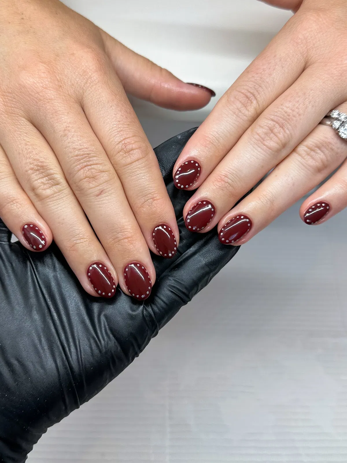 Burgundy Nails with Perimeter Dot Detailing