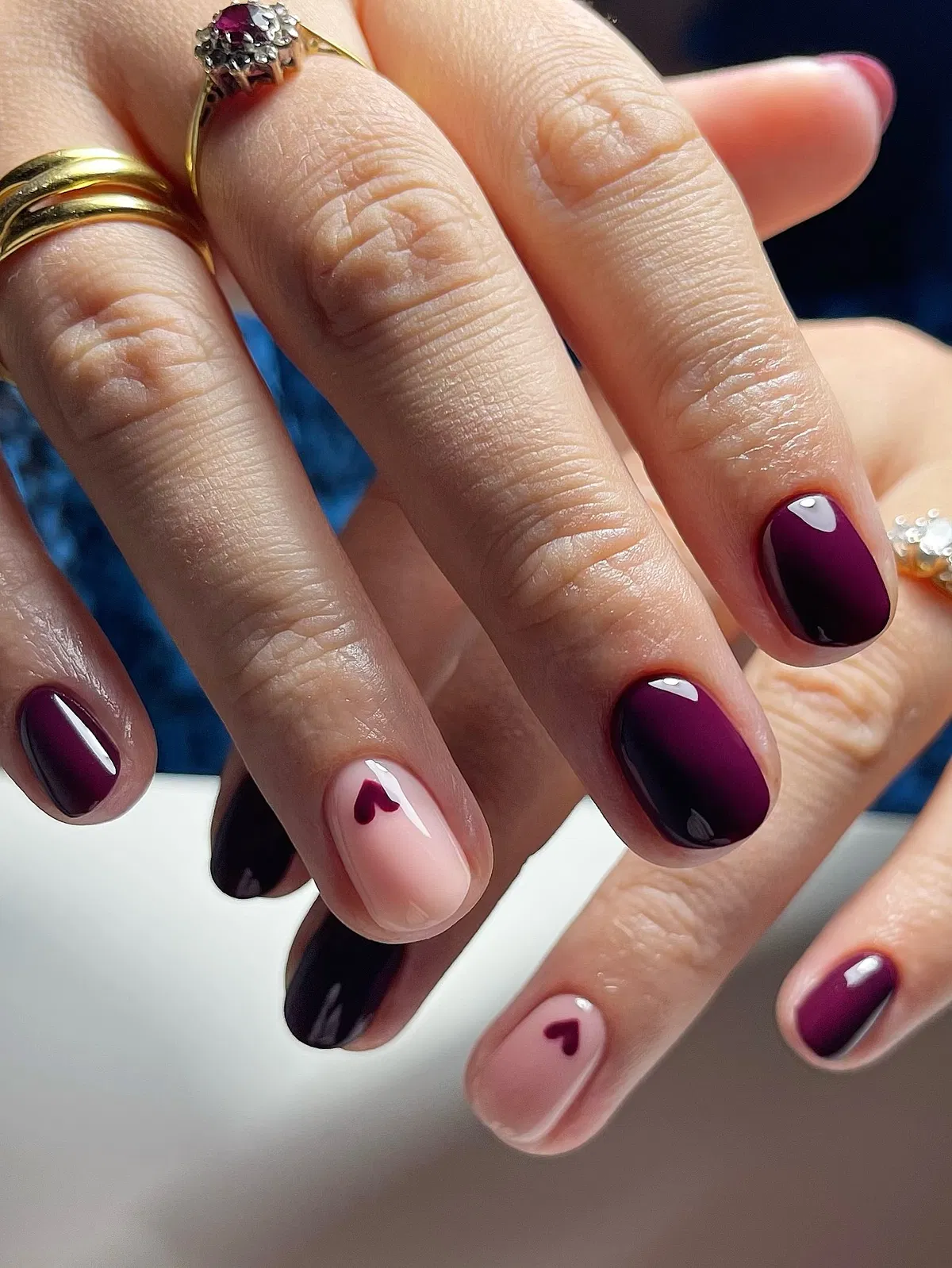 Short dark plum with tiny heart accents