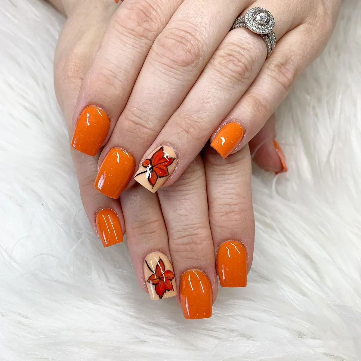 Bright Orange with Leaf Accent Nails
