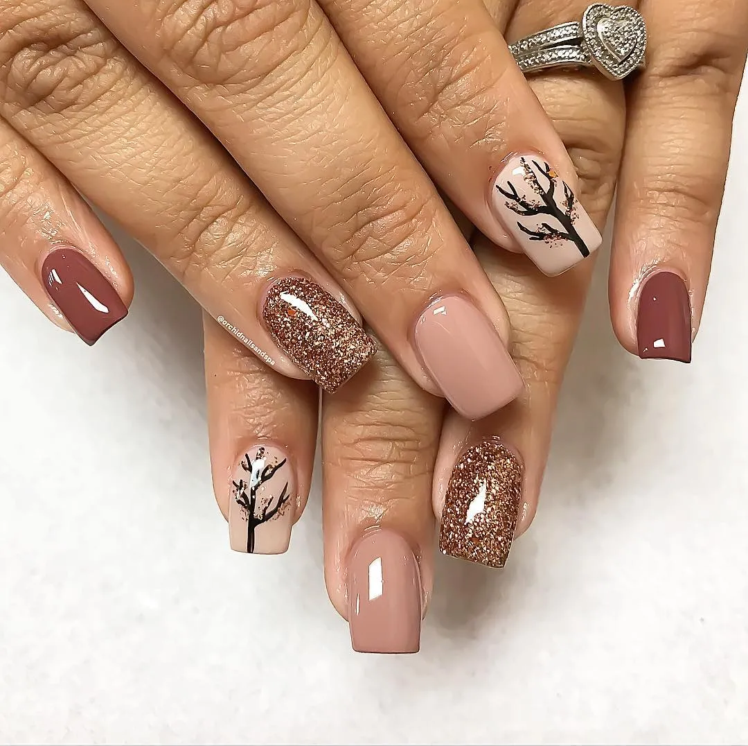 Mauve, nude, and copper glitter with tree silhouettes