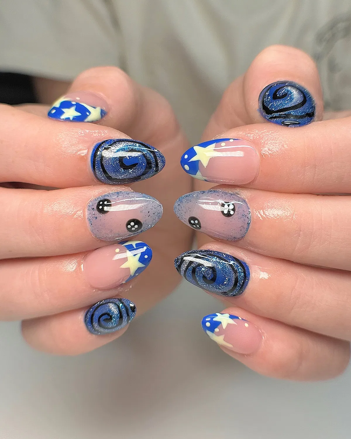 Blue star tips and dark blue swirl accents