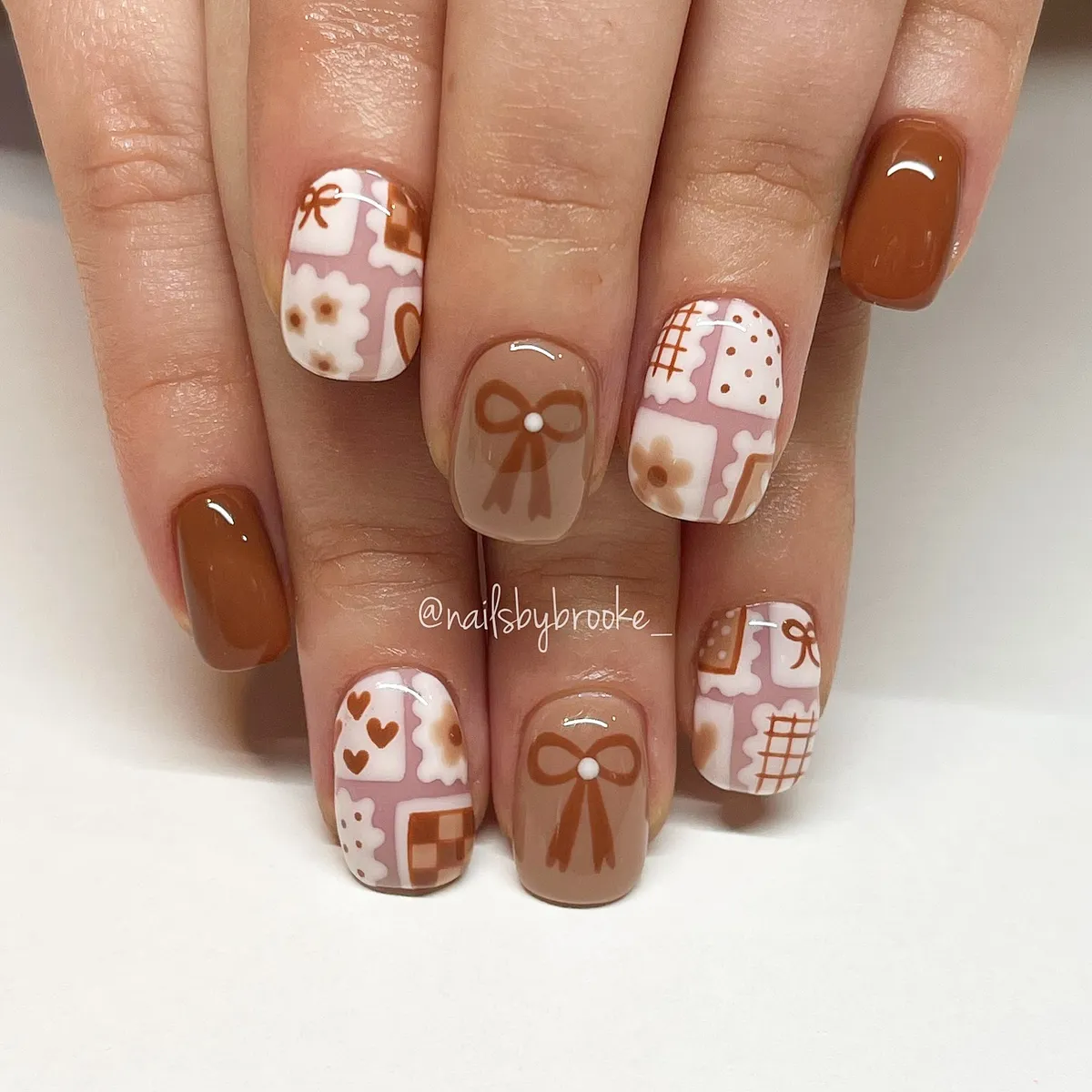 Warm brown solids with patchwork art and bow detail