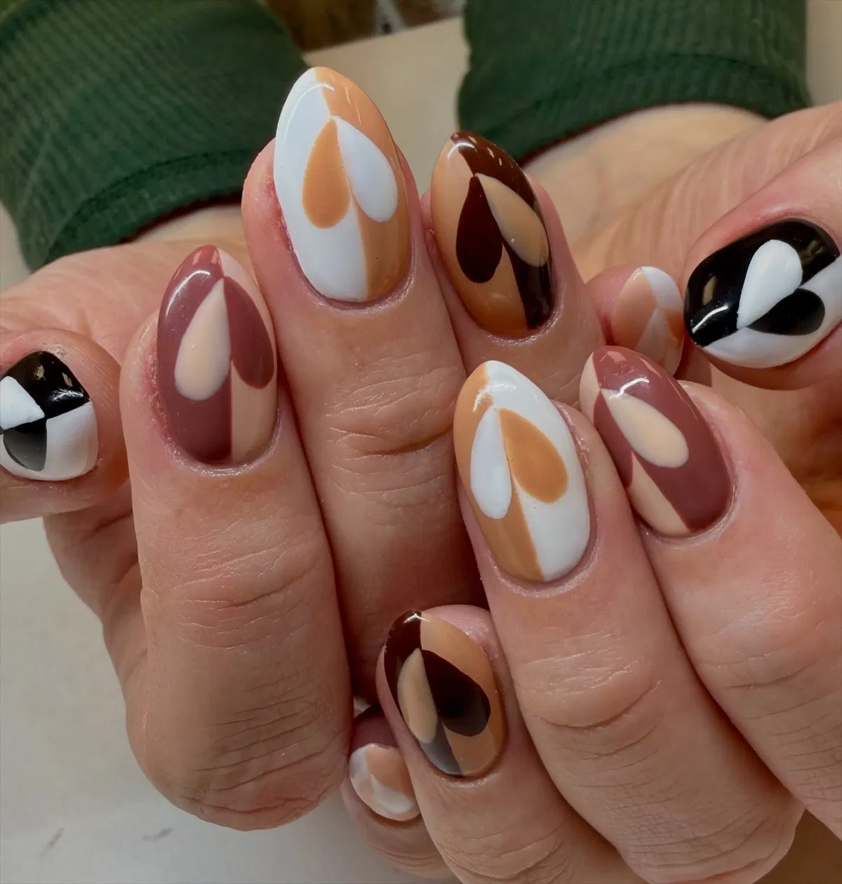 Abstract teardrop shapes in neutral color blocks