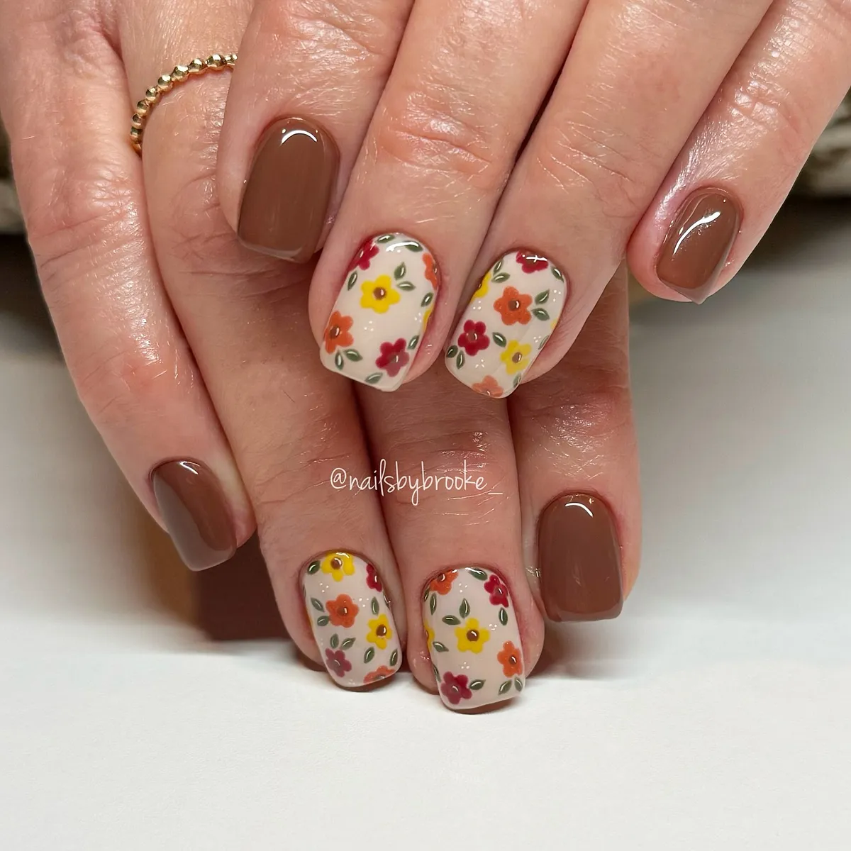 Brown and cream manicure with tiny floral print