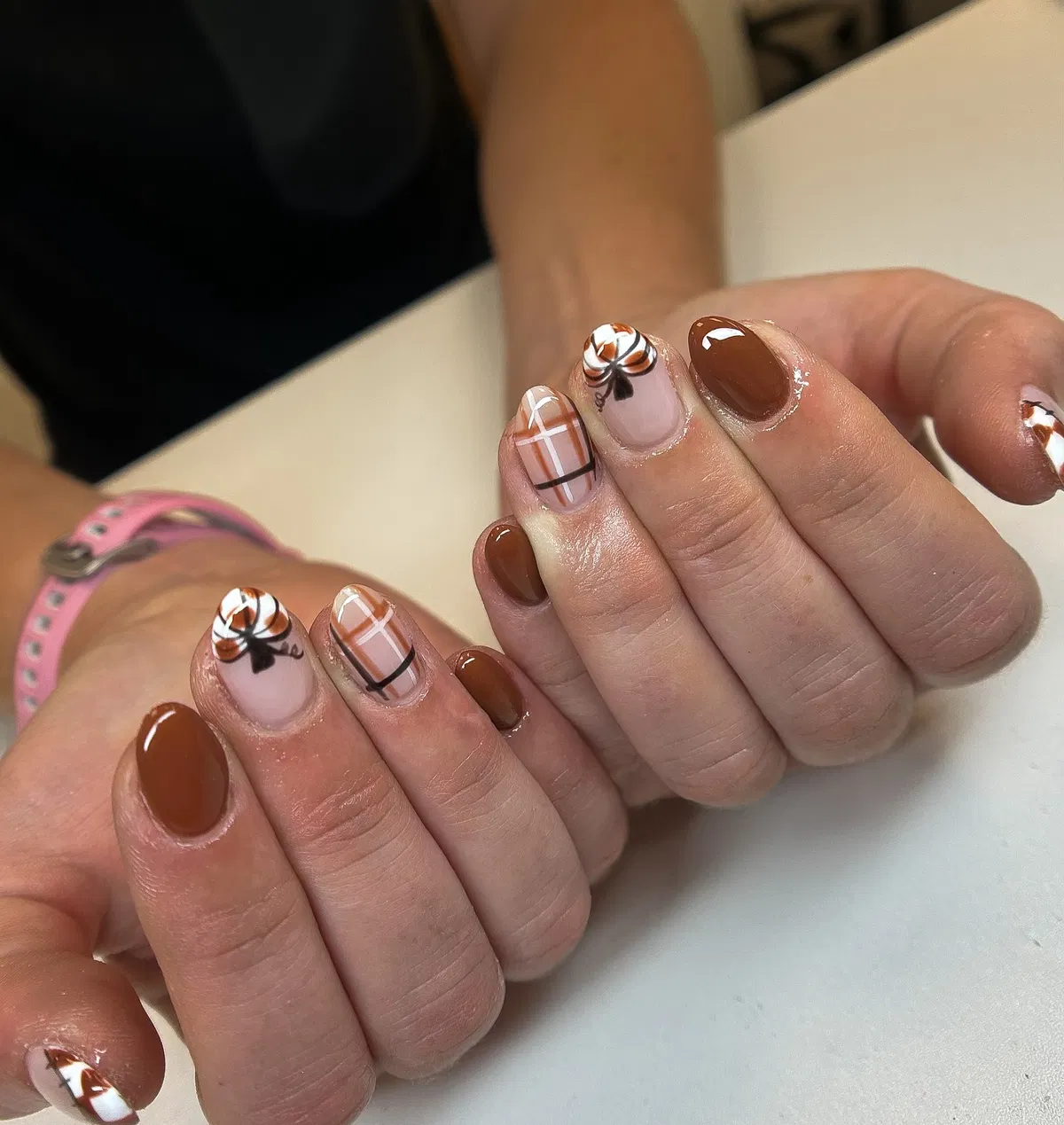 Glossy brown solids with grid-line and swirl accents