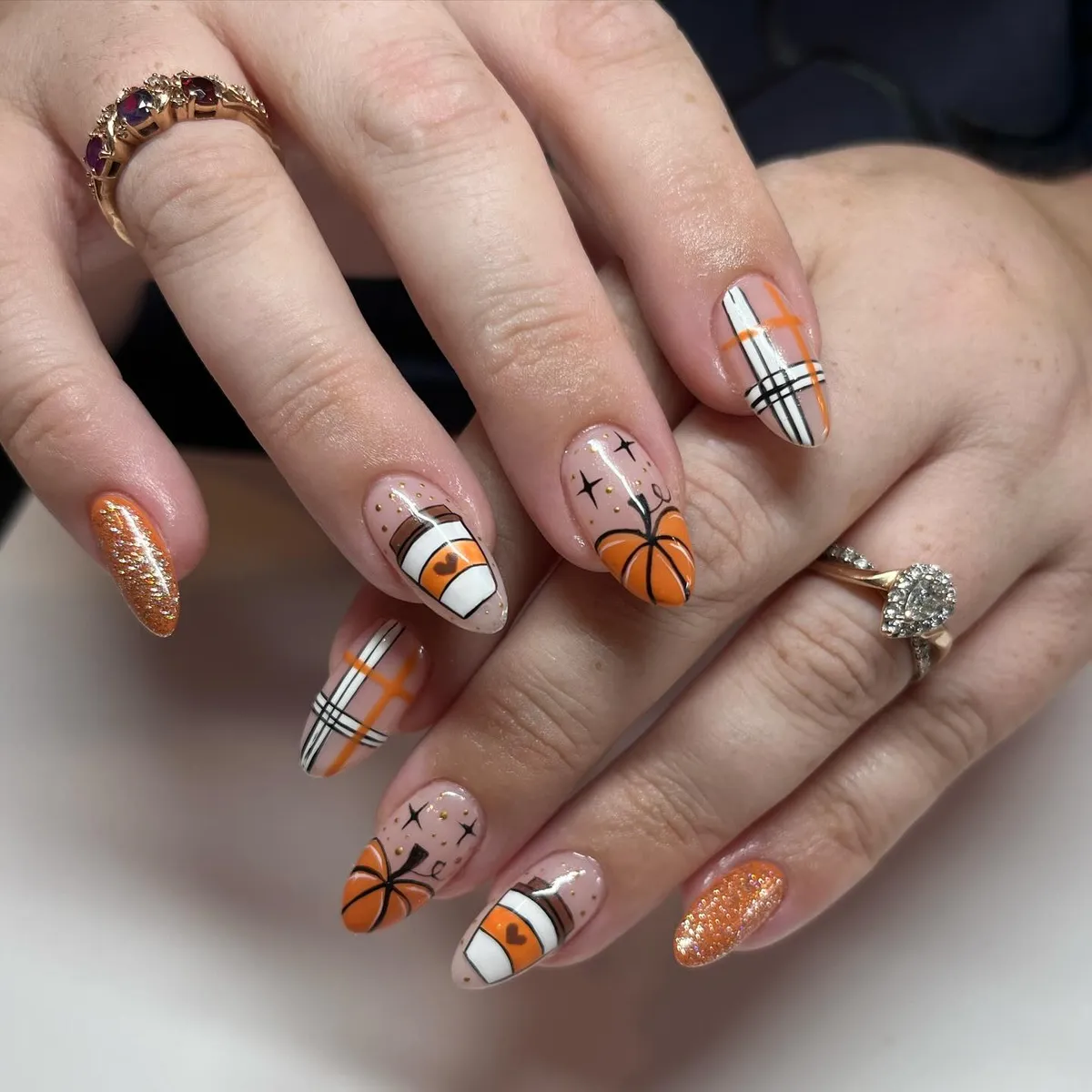 Orange plaid with pumpkin, stars, and cup graphic