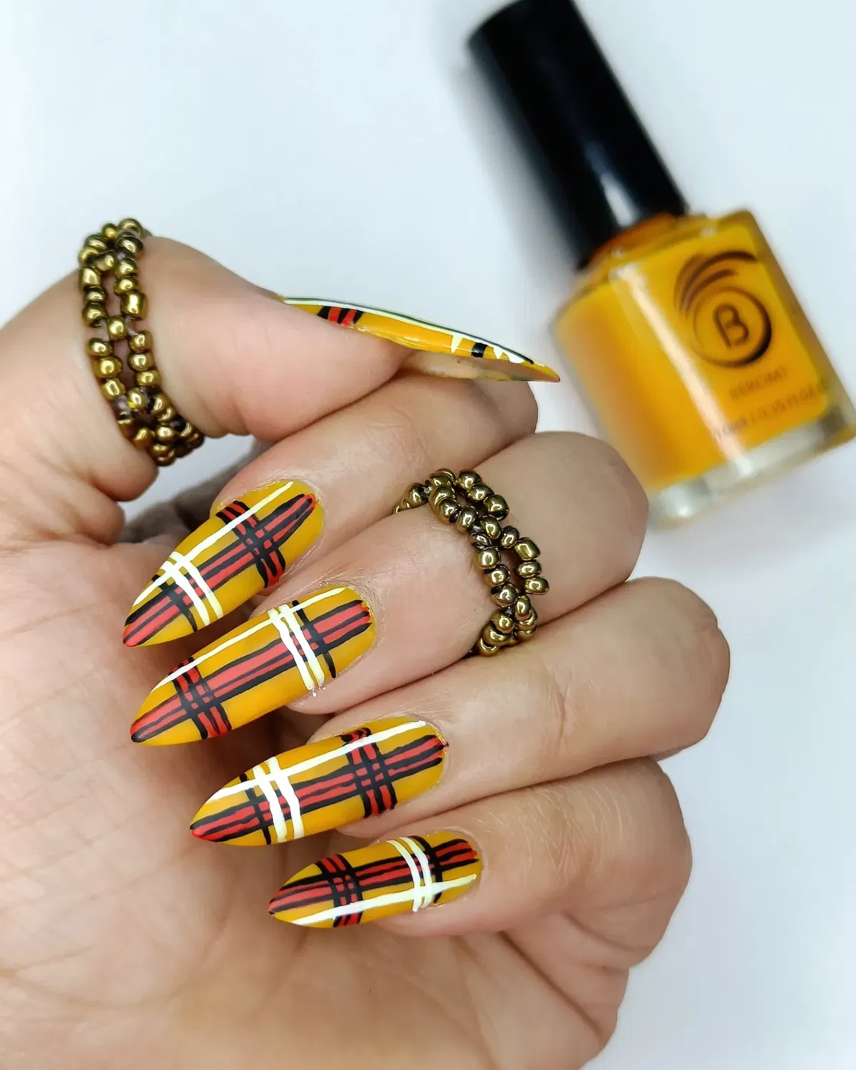 Mustard plaid with red/black/white striping