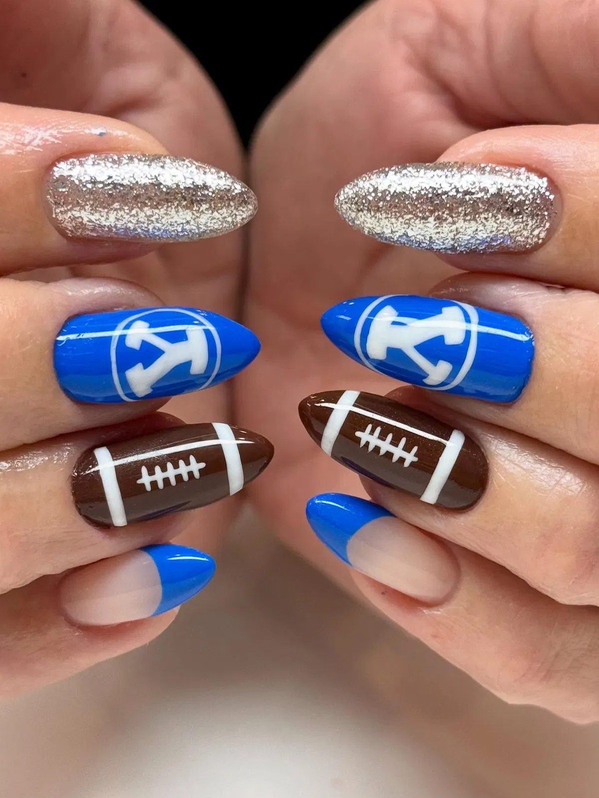 Blue letter accents, silver glitter, and football-style browns