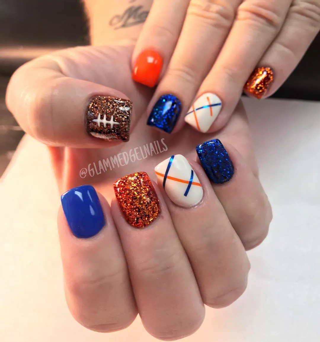 Orange and blue glitter mix with lace and stripe accents