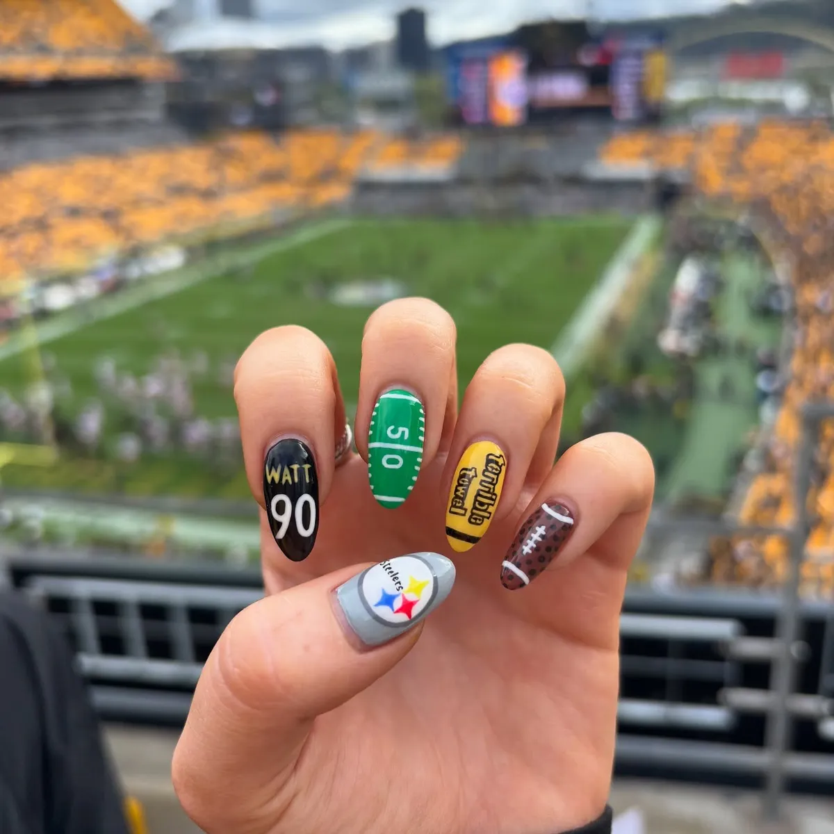 Black name/number + yellow text nail + field and football textures