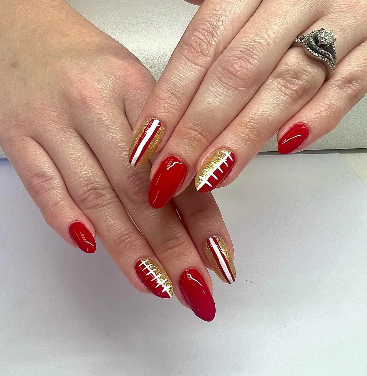 Red and Gold Glitter with Football-Lace Accent Nails