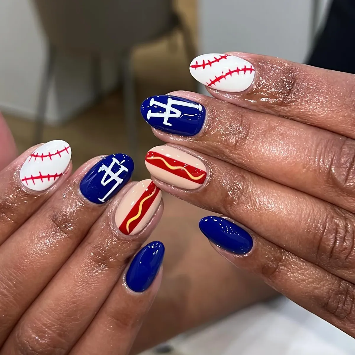 Blue monograms with stitch and wavy stripe accents