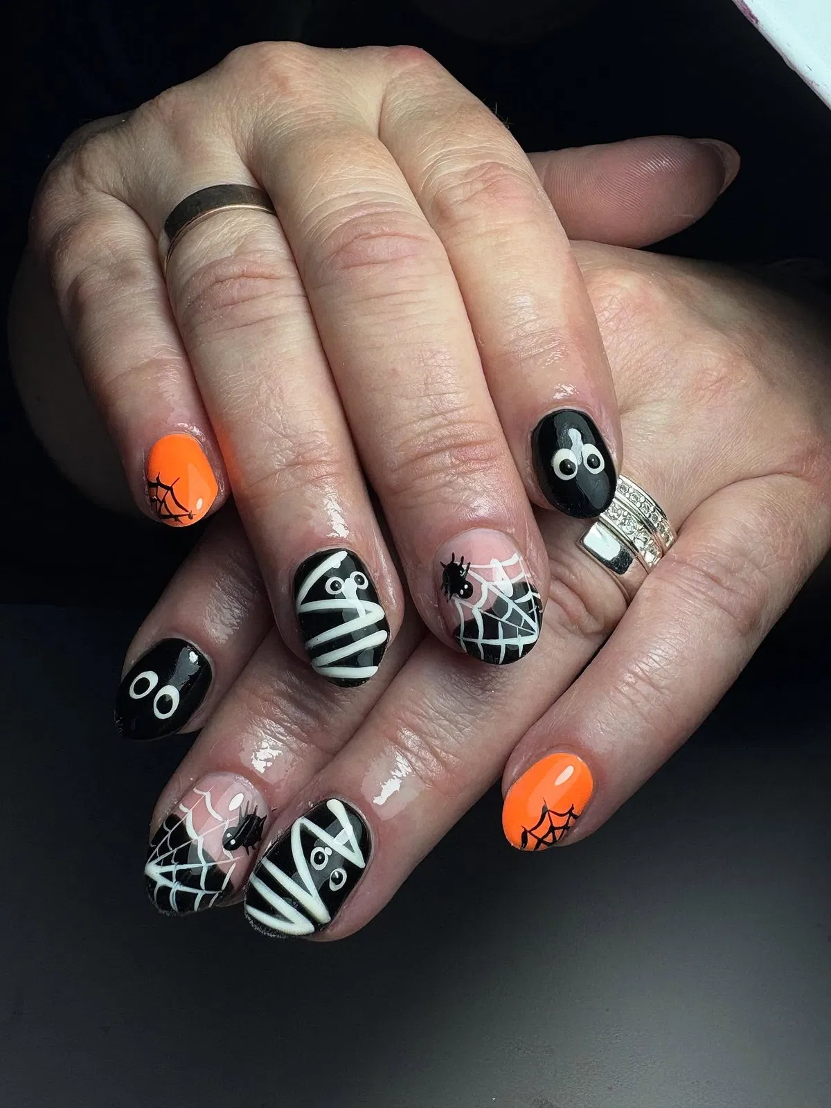 Black-and-orange set with eyes, wraps, and webs