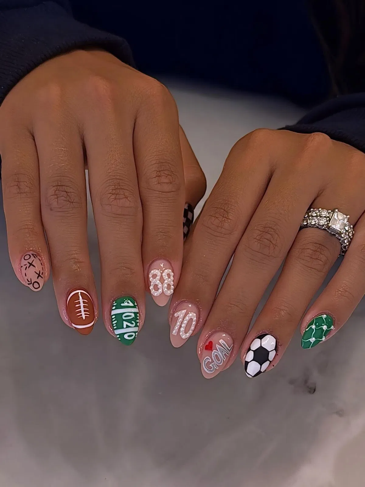 Mixed sports set with raised numbers, field lines, and ball graphics
