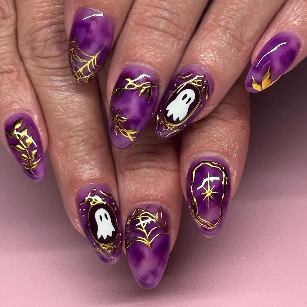 Purple marbled set with gold linework and framed ghosts