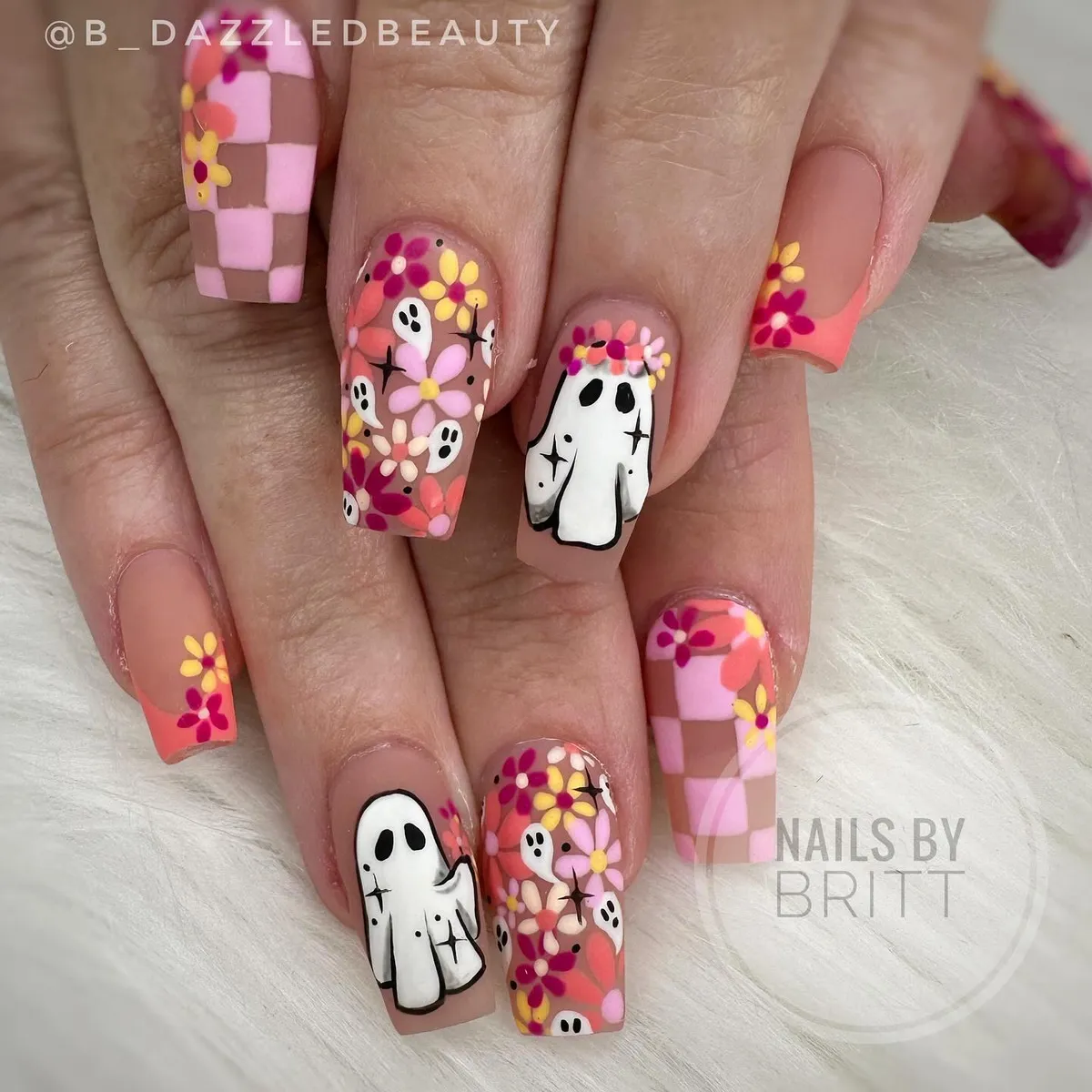 Floral checkerboard with white ghost feature nails