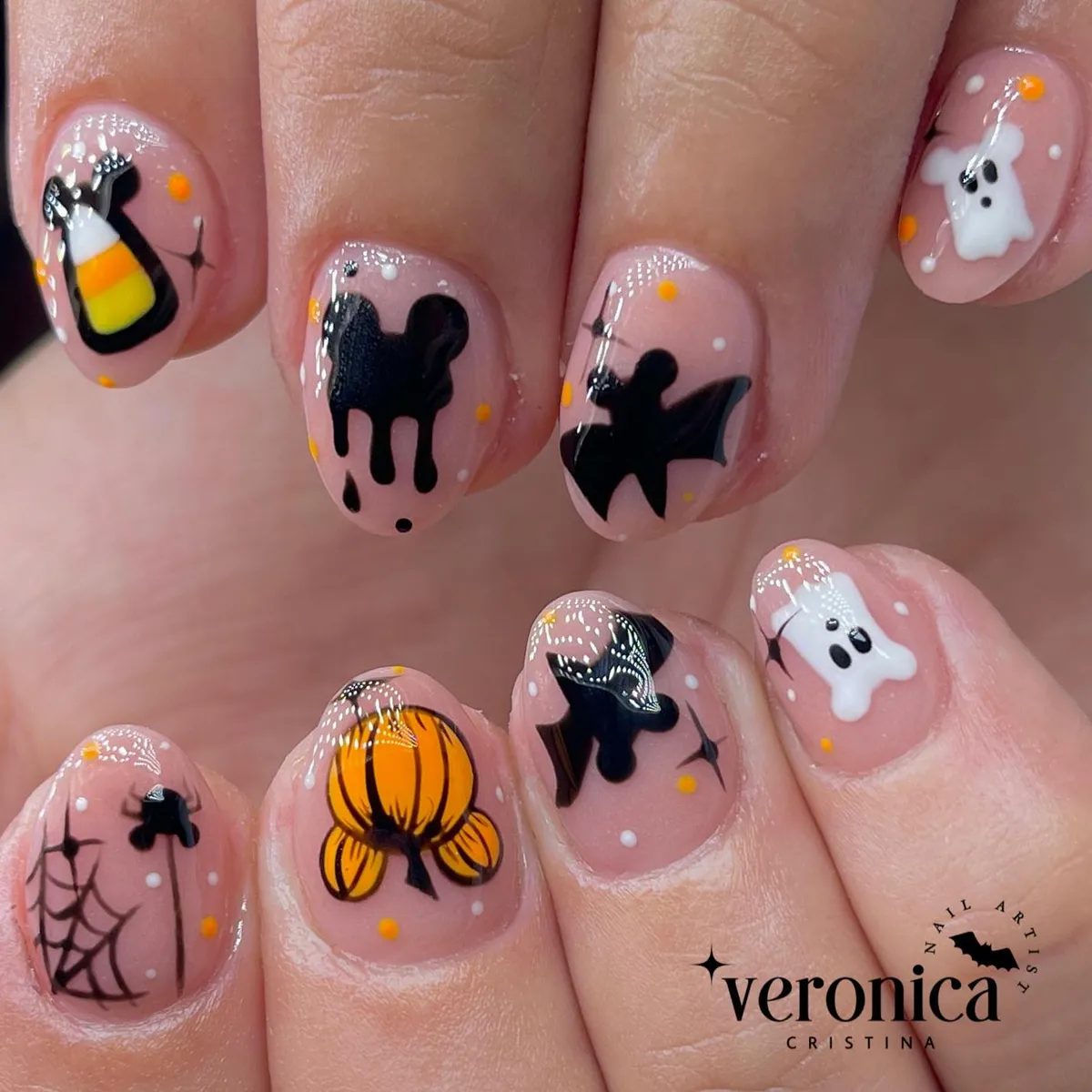 Nude-pink Halloween icons with dots and sparkle marks