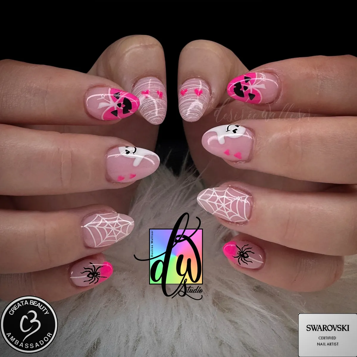 Sheer pink webs with hot pink pumpkin tips and spiders