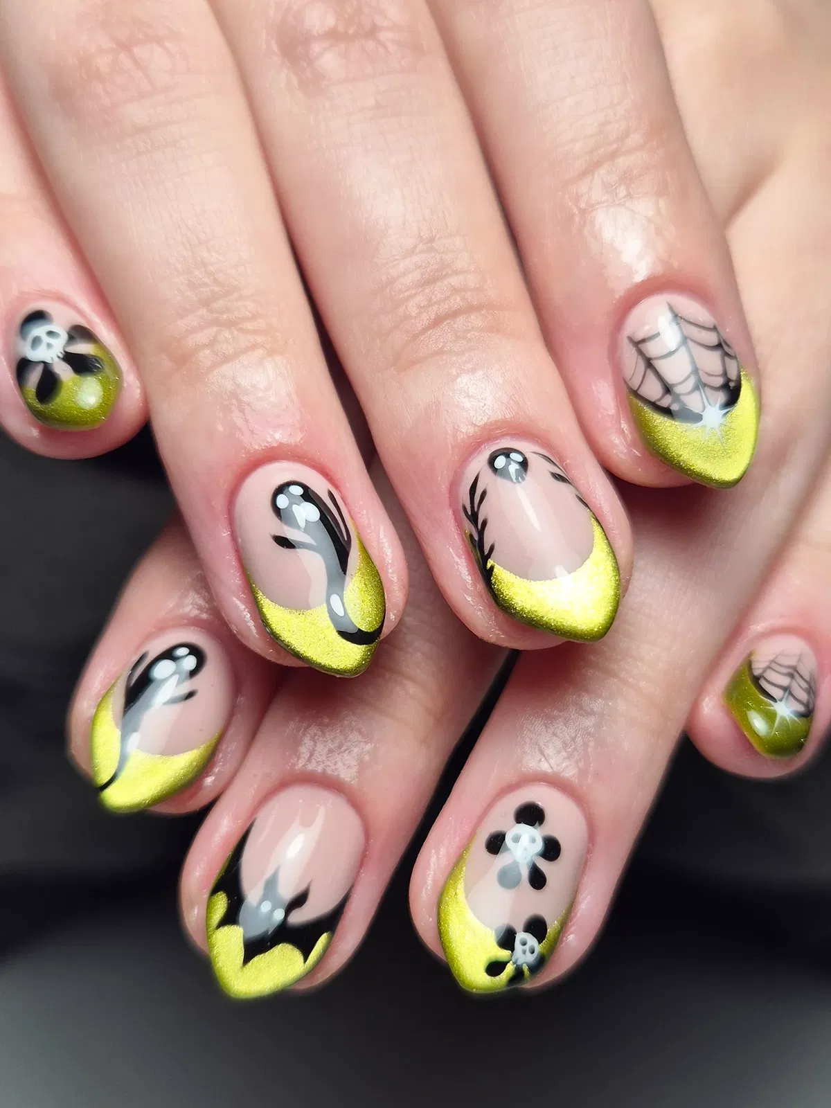 Metallic lime tips with ghost and web details
