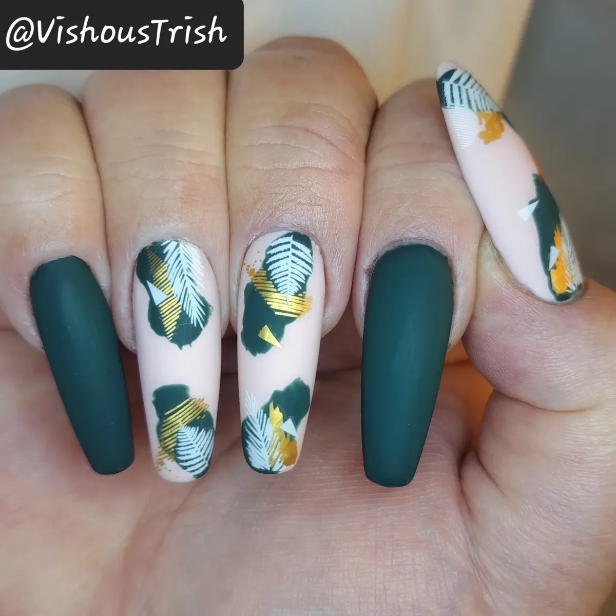 Matte dark green with leaf graphics and gold striping