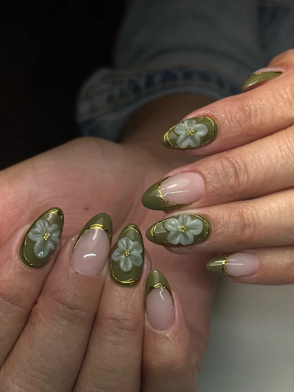 Olive French tips with gold outlining and 3D floral accents