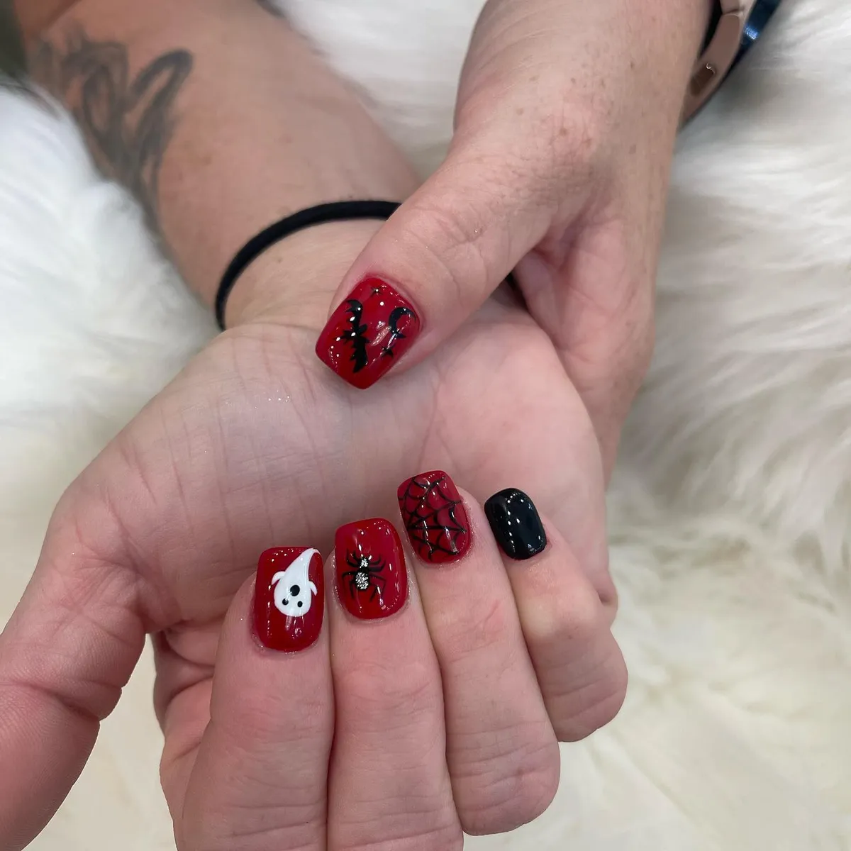 Deep red set with ghost, spider, web, and bat accents