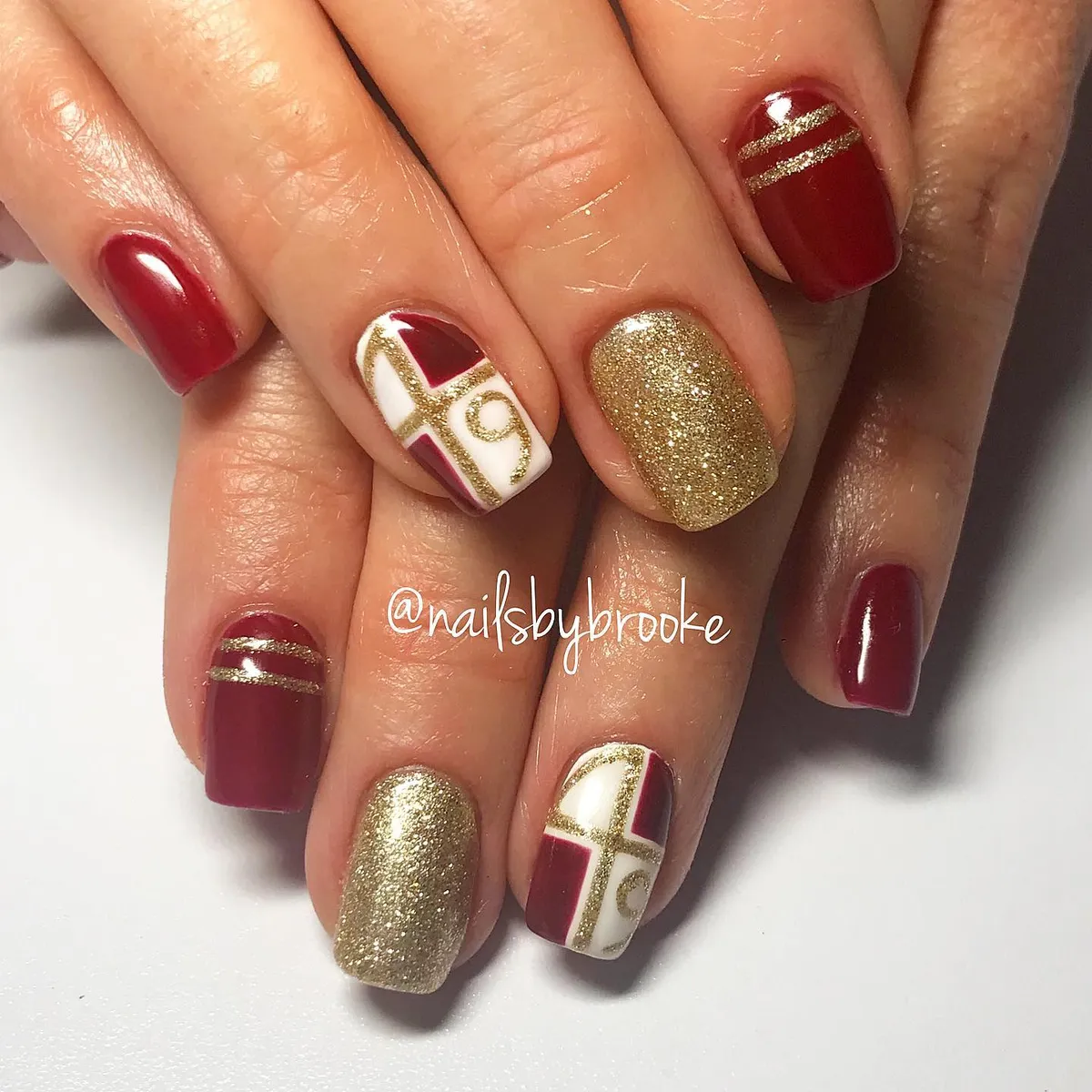 Maroon, White, and Gold Glitter with Number "9"