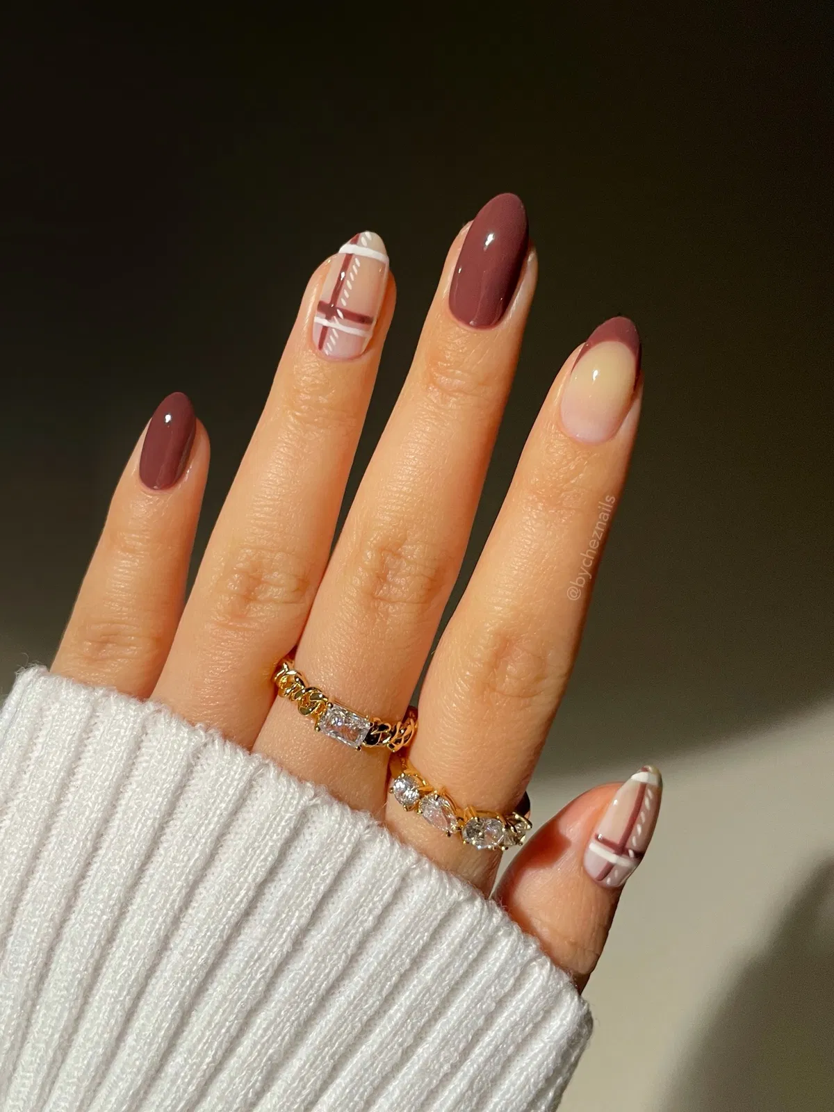 Mauve-brown solids with nude color-block and plaid accents