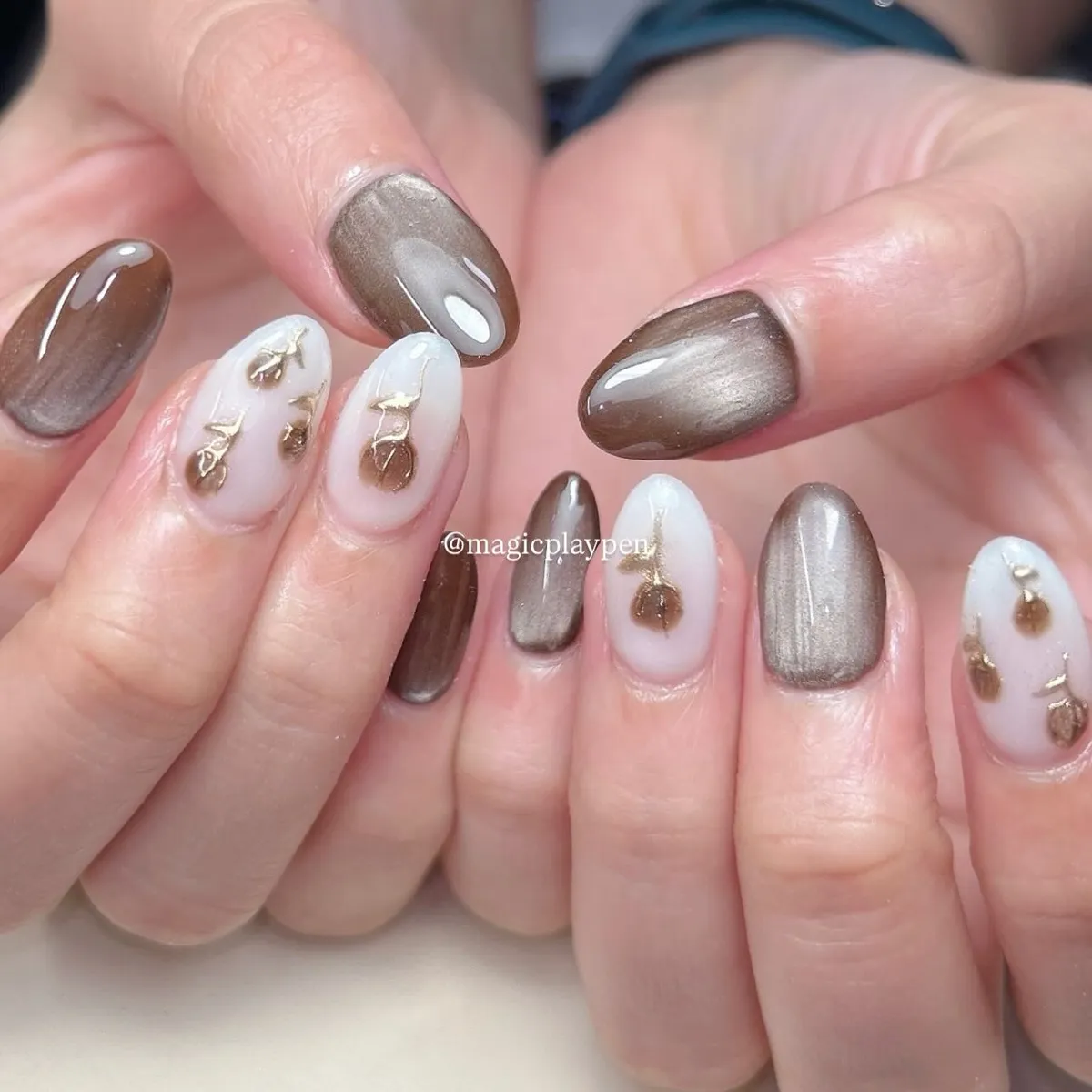 Metallic taupe-brown and milky white with gold accents