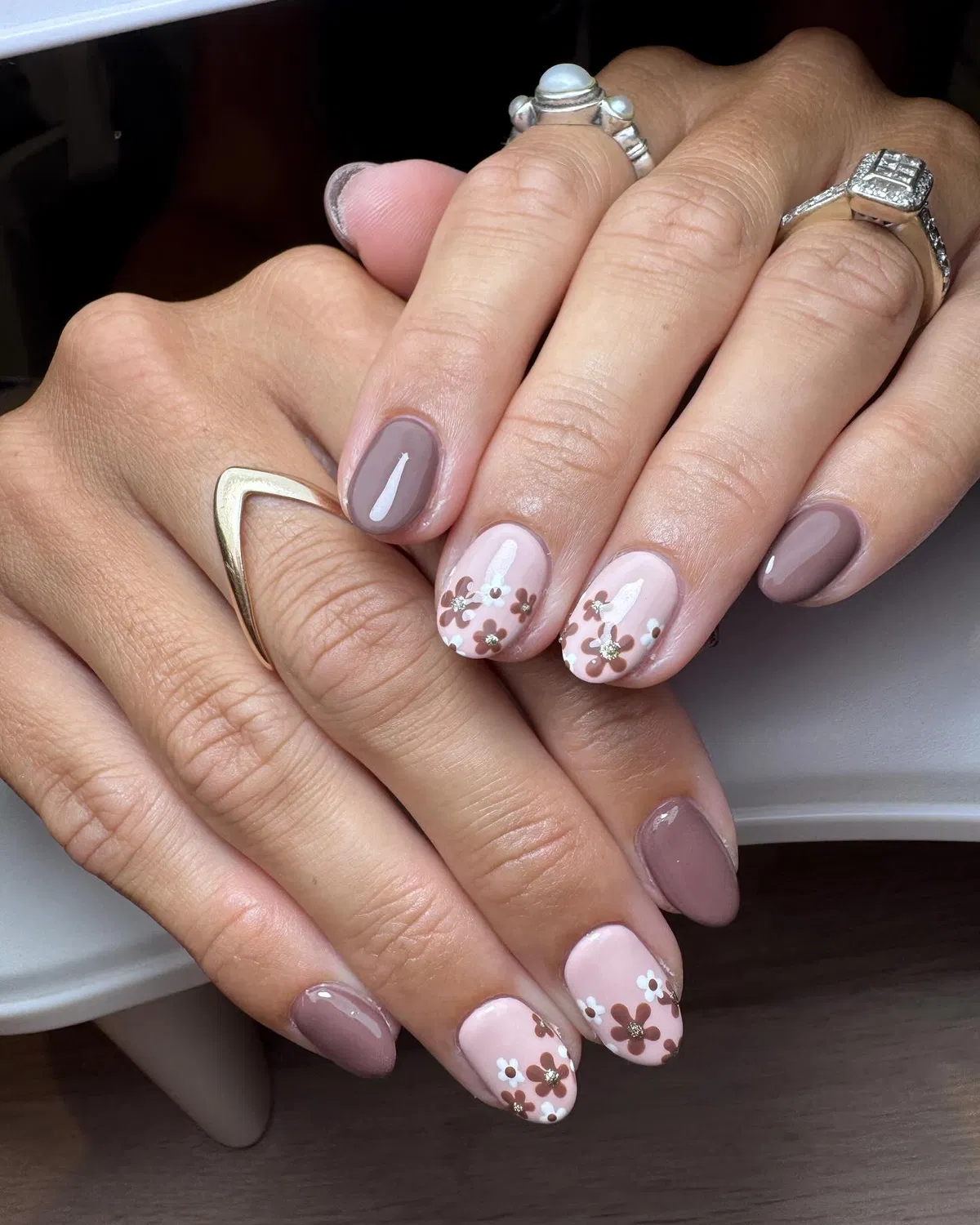 Taupe and pale pink with brown-and-white floral accents