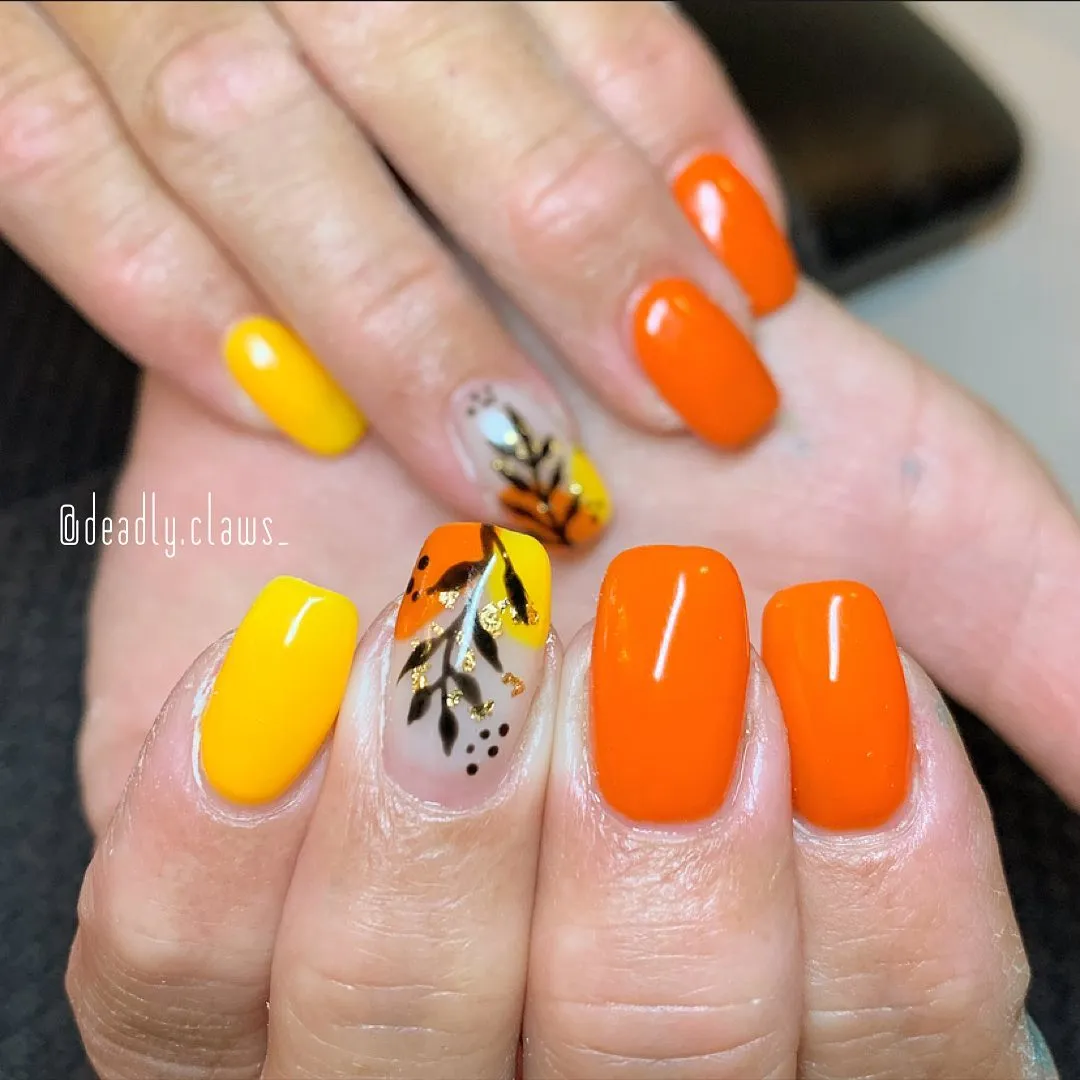 Yellow and orange solids with botanical accent and gold foil-like flecks