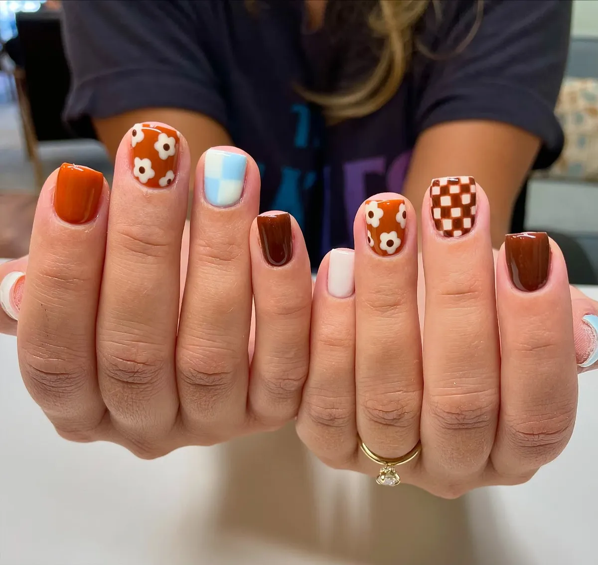 Mixed browns with floral and checker accents