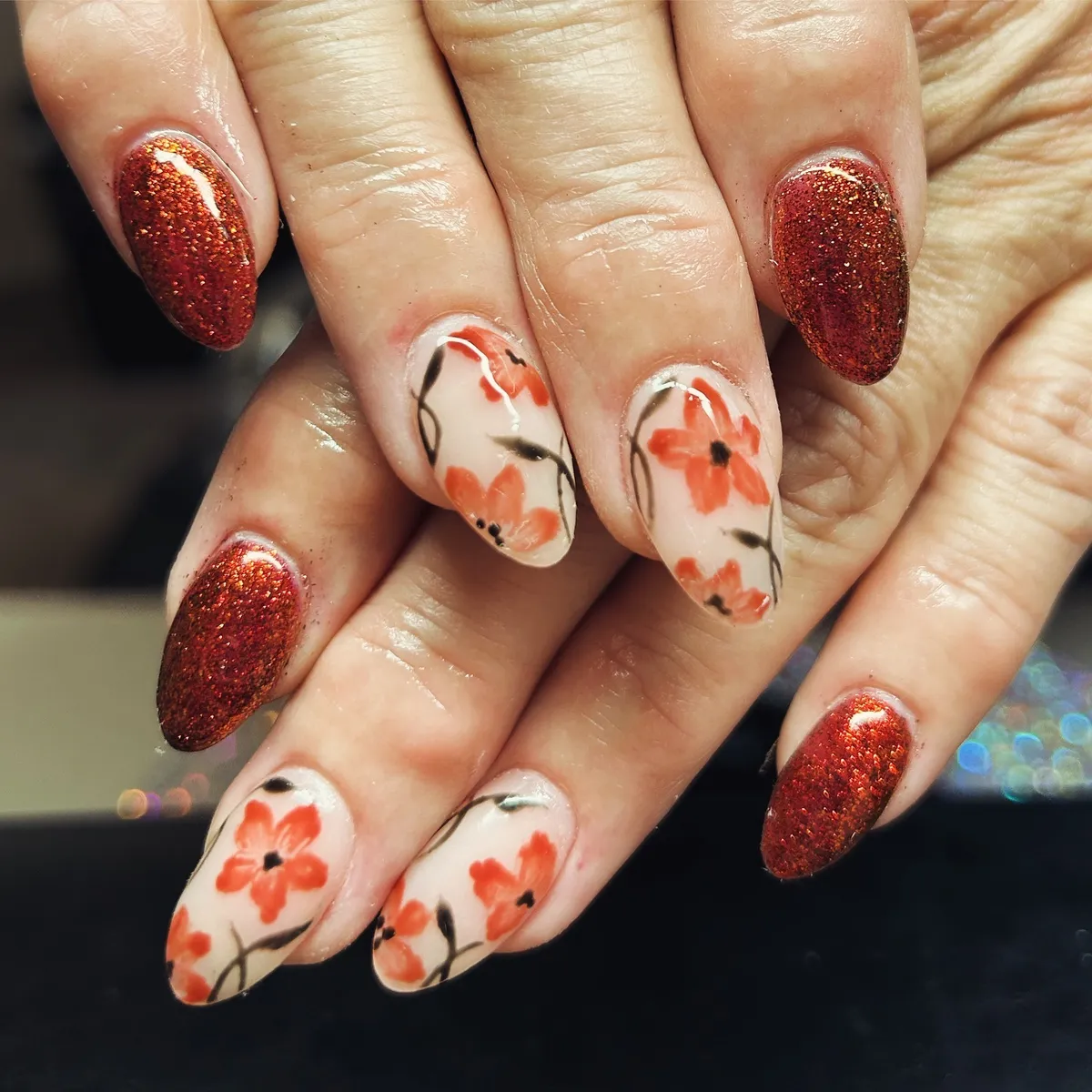 Deep orange glitter with orange floral overlays