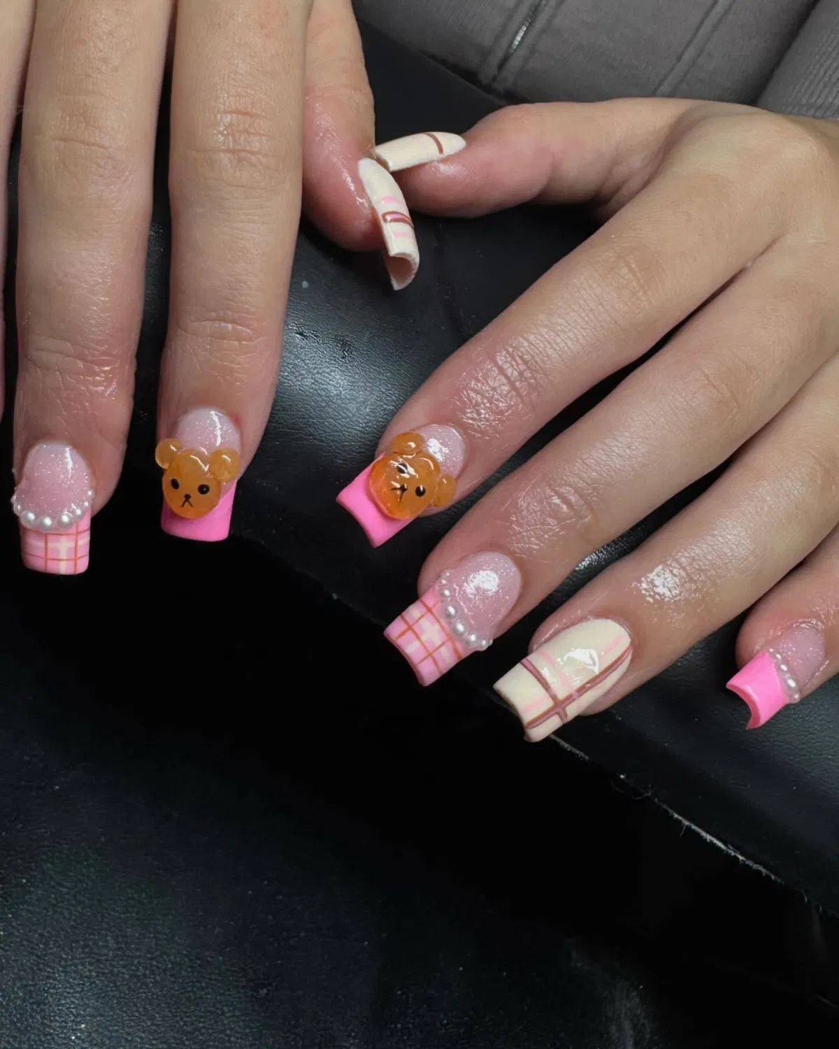 Pink plaid and bear accents with pearl-like details