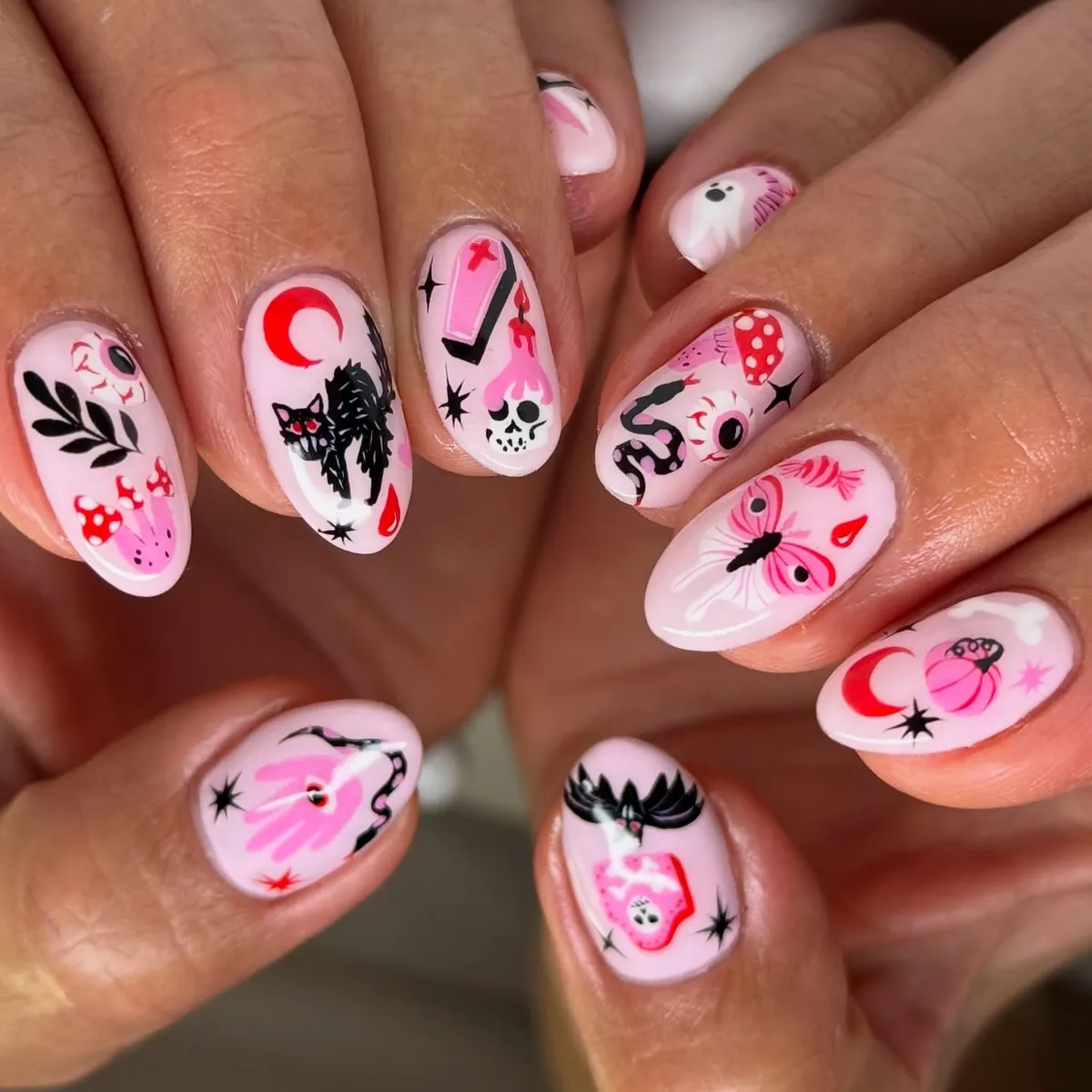 Light pink set with cat, skull, snake, and moons