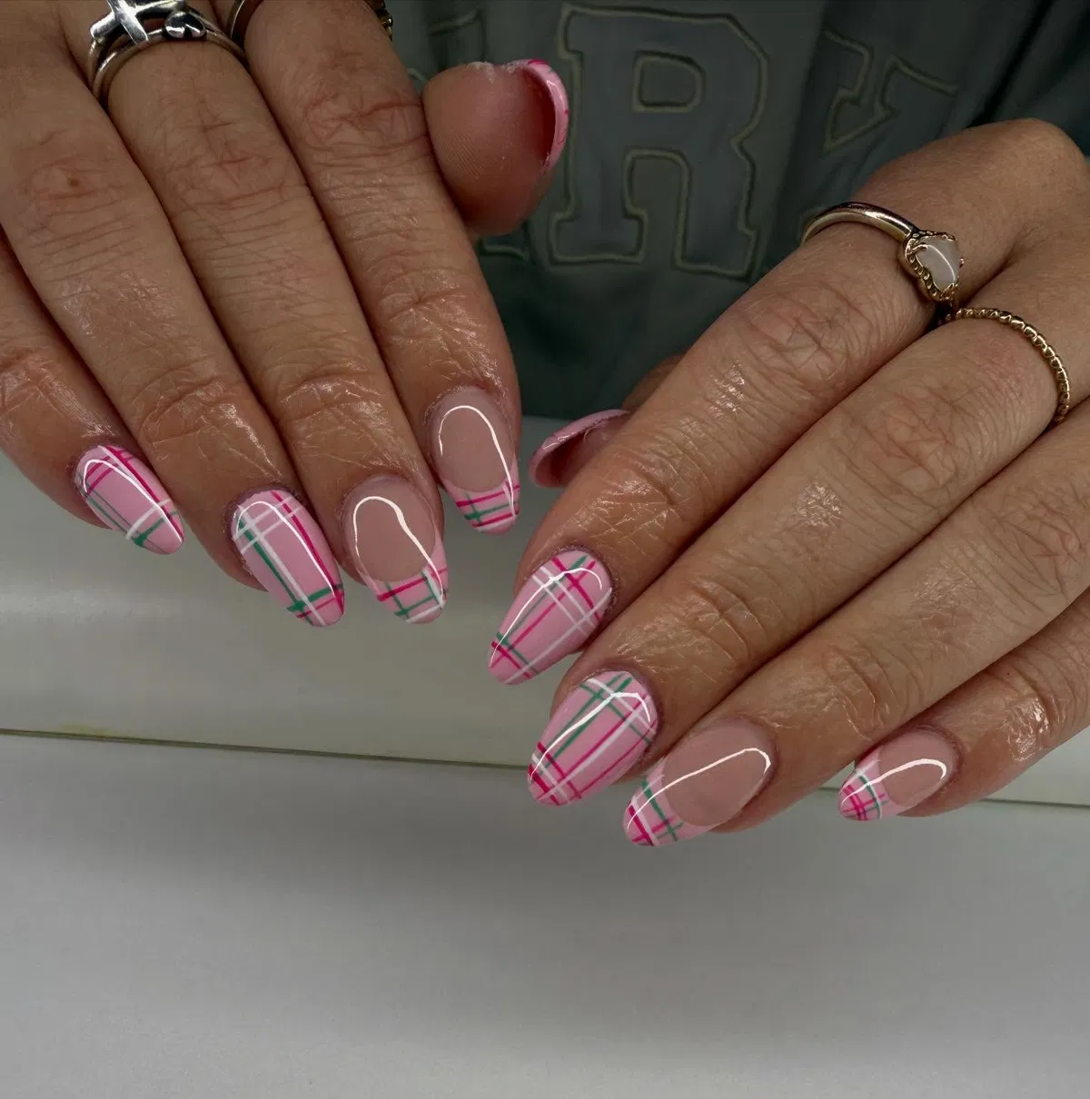 Pink plaid French tips with white and green striping
