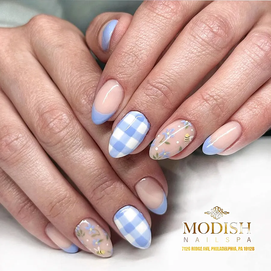 Light blue tips with check accent and floral/bee motif