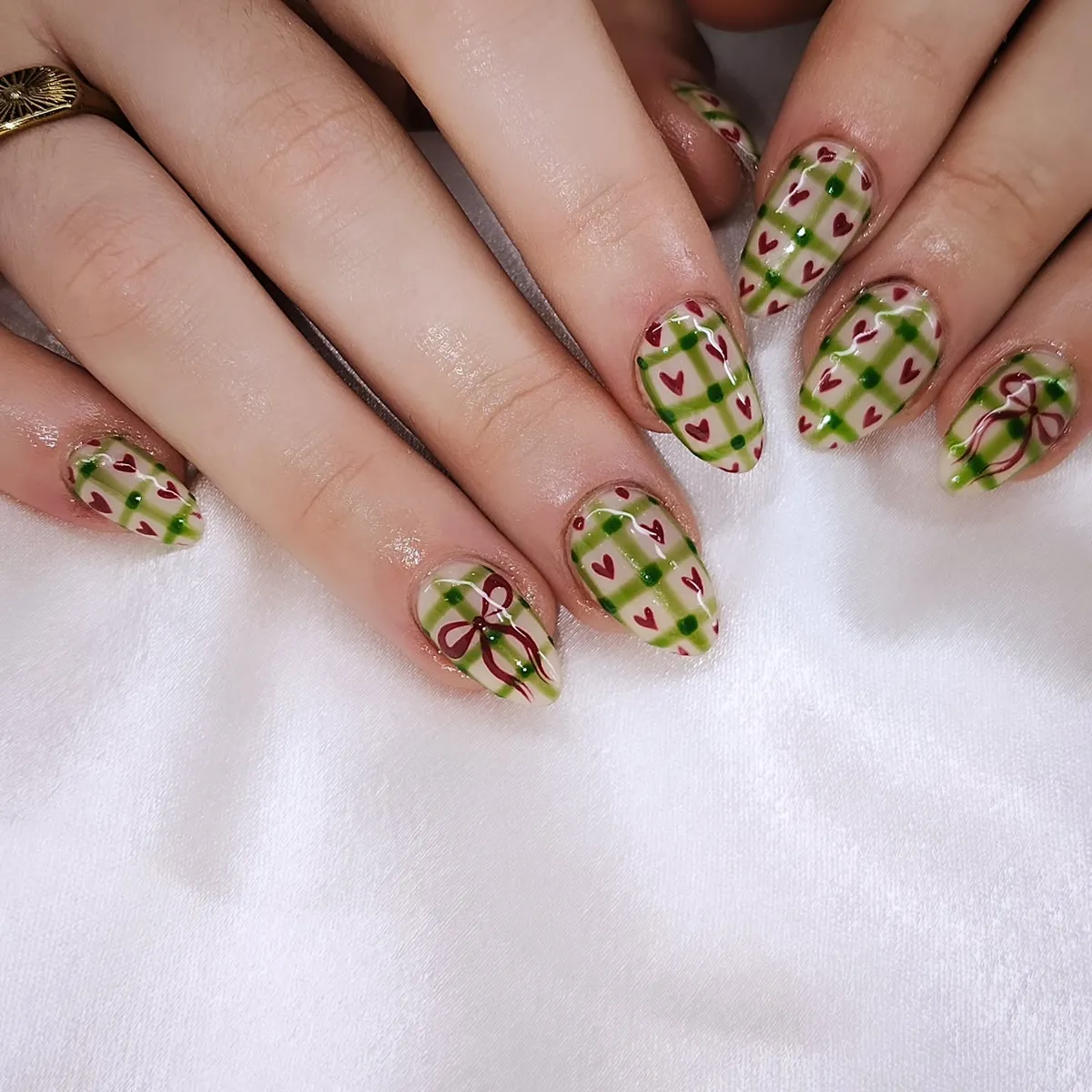 Green plaid with red hearts and bow accents