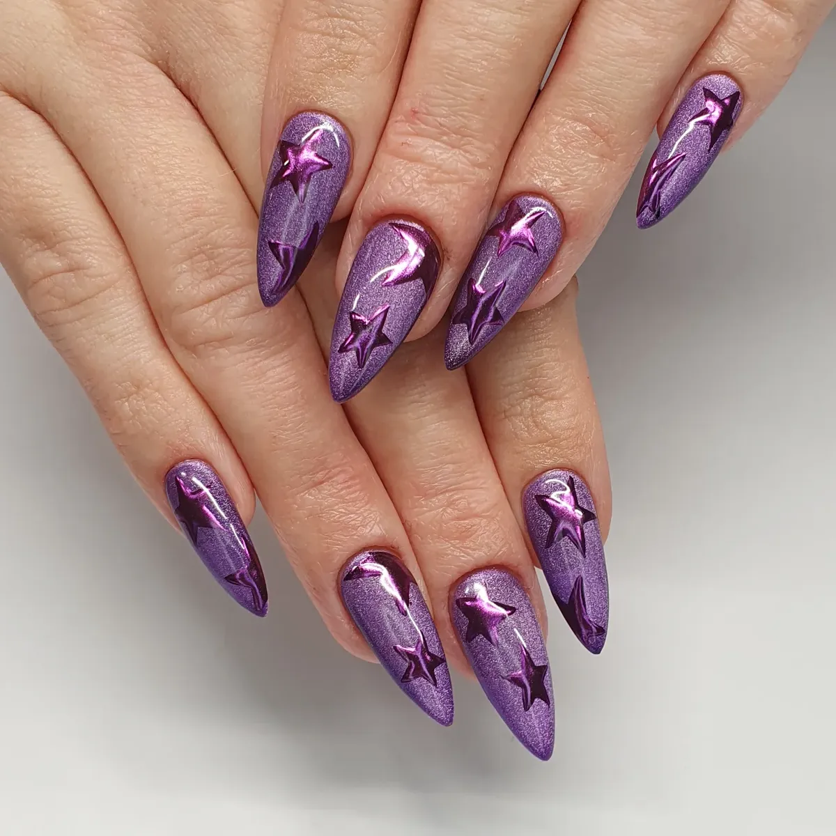 Stiletto purple shimmer with raised star accents