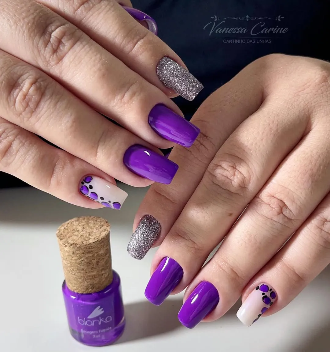 Bright purple squares with silver glitter and dotted nude accents